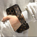 Trendy Designer Printed Wrist Strap Phone Case